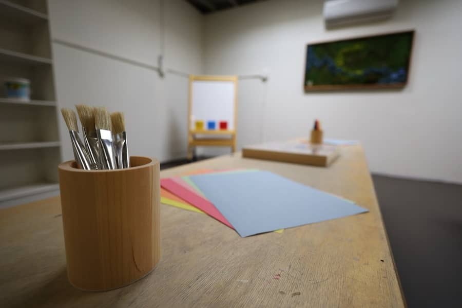 Paintbrushes and paper ready for a morning of art